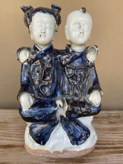 Early Chinese Qing Dynasty blue/white figurine of boy/girl or brother/sister