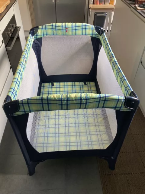 Mothercare Travel Cot VGC with worn but useable storage/carry bag