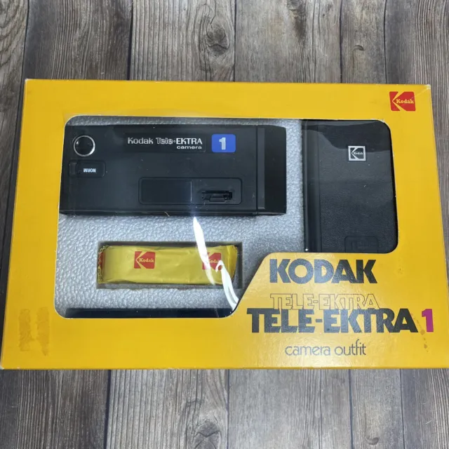 Kodak Tele-Ektra 1978 vintage 2 con película, manual, flash abatible, accesorios con caja