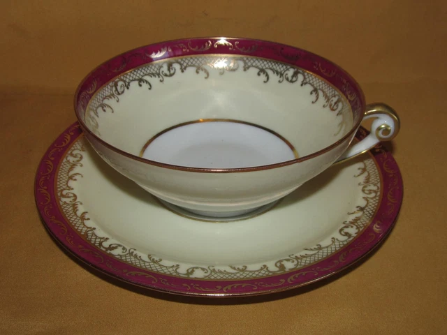 tasse et sous-tasse en Limoges de couleur rouge - brocante