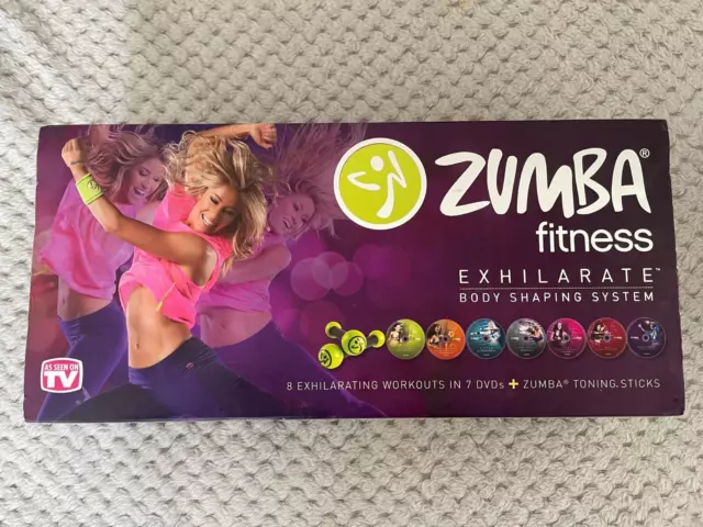 Zumba Fitness Exhilarate Body Shaping System 7 DVDs  + 2 Toning Sticks & guide