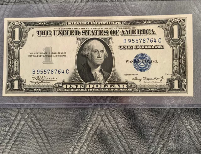1935-A - $1  Silver Blue Seal Cert . uncirculated, Off Center Cut,Very Sharp!