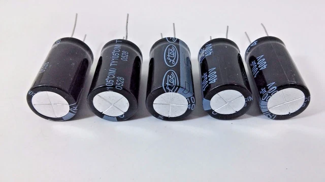 thumbnail image 2 of 5pcs 450V 100uF Aluminum Electrolytic Capacitors - 105°C, 18x30mm, PCB Mount 2 of 6