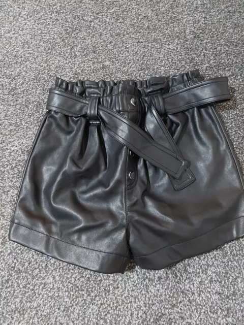 Pantaloncini in finta pelle per ragazze River Island - Età 11 anni