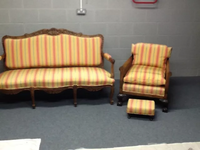 SETTEE FRENCH WALNUT C 1900, with two BERGERE armchairs and footstool.