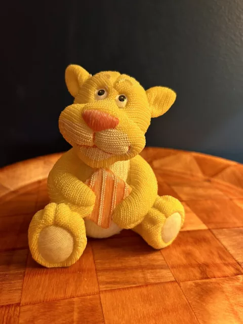 K's Collectibles ceramic baby lion, crochet look holding gift