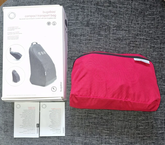 Bolsa de transporte compacta abeja Bugaboo, negra con estuche rojo abierto nunca usado.