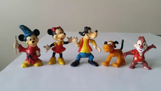 Disney figures: Mickey of Fantasia, Minnie, Goofy, Pluto, rescue ranger Dale