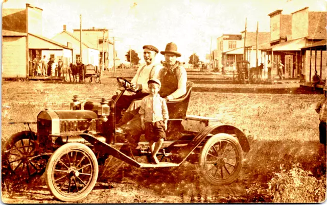 Vintage RPPC Real Photo Postcard Curt Peterson old car Kansas Dirt street 1913?