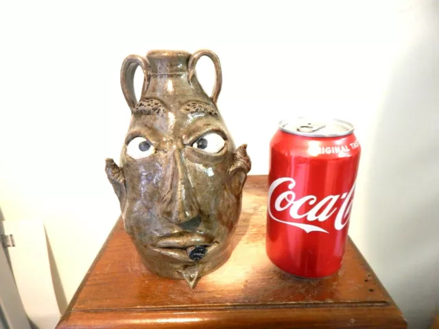 wayne hewell  face jug, pottery, folk art  7''x 5''