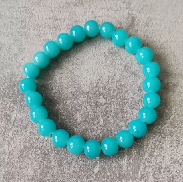 Bracciale elasticizzato con perle in vetro azzurro