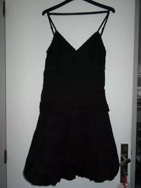 Robe noire col V sans manches longueur genoux et ceinture Taille 38 CACHE CACHE