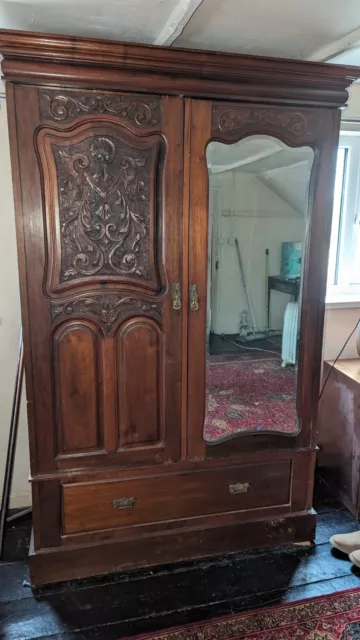 Beautiful antique wardrobe with mirror and large drawer