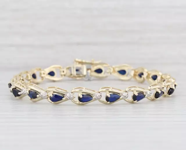 8.45. Ct Pear cut  Blue  Sapphire Women tennis Bracelet in Sterling silver