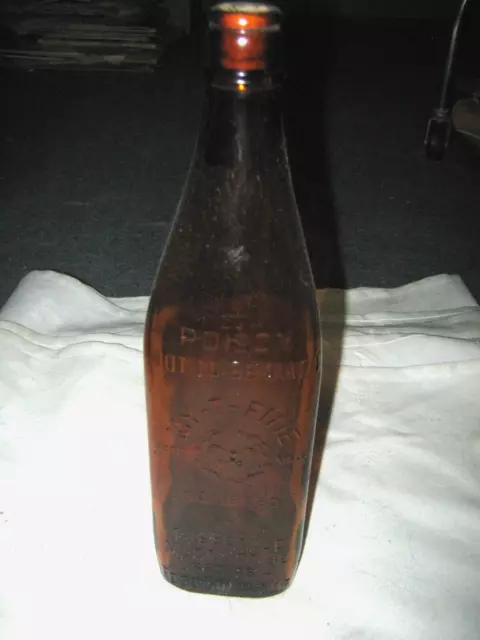 An Old Vintage Australian My T Fine Amber Trianglular Poison Bottle No 69880
