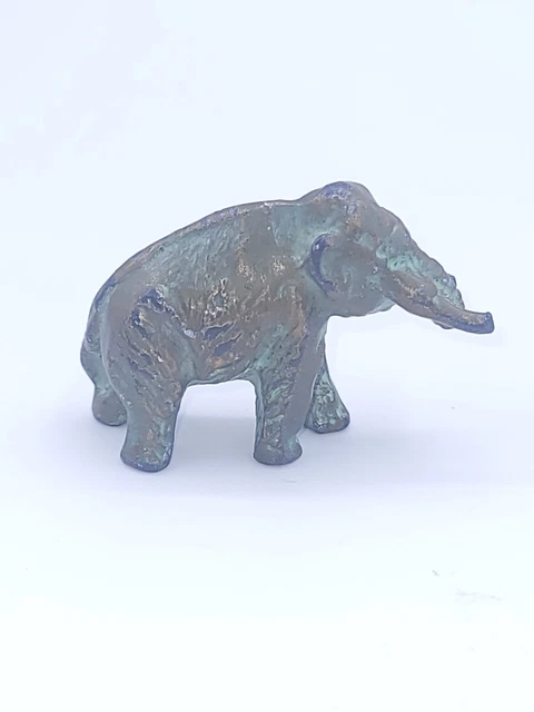 Vintage 1940's SRG 47 Cast Metal Brass Bronze Dinosaurs Mammoth VG