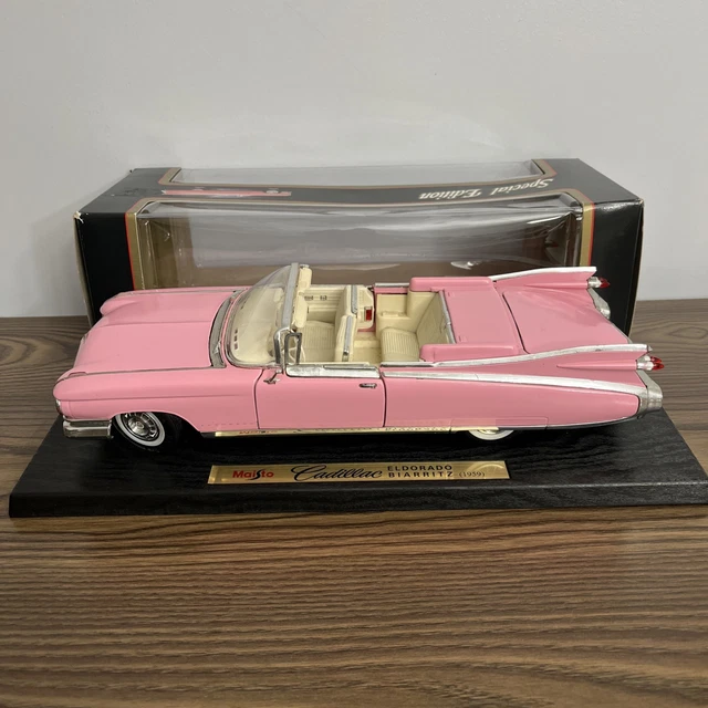 A Maisto 1:12 Scale Pink Cadillac Eldorado Biarritz 1969 Diecast Model