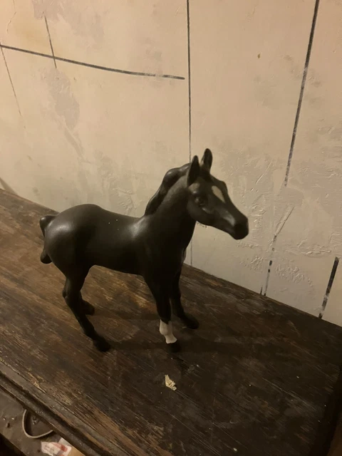 A Beswick Connoisseur Model Black Beauty and Foal figurine on wooden plinth