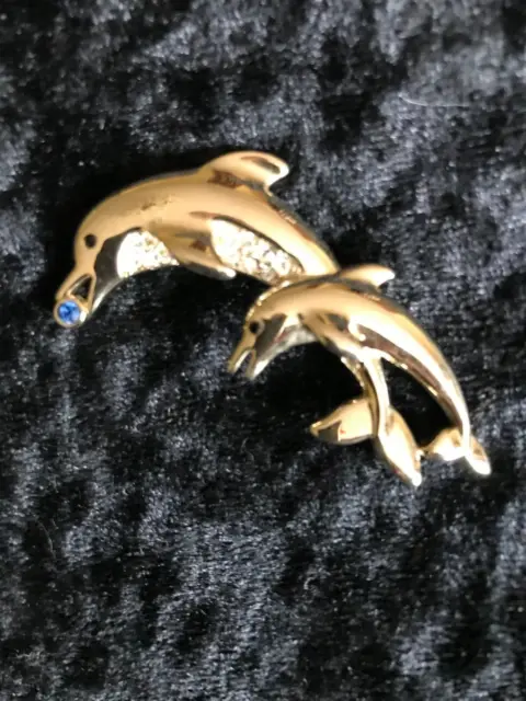 Dolphin nnt costume jewellery brooch. 6 cms long, diamante trim