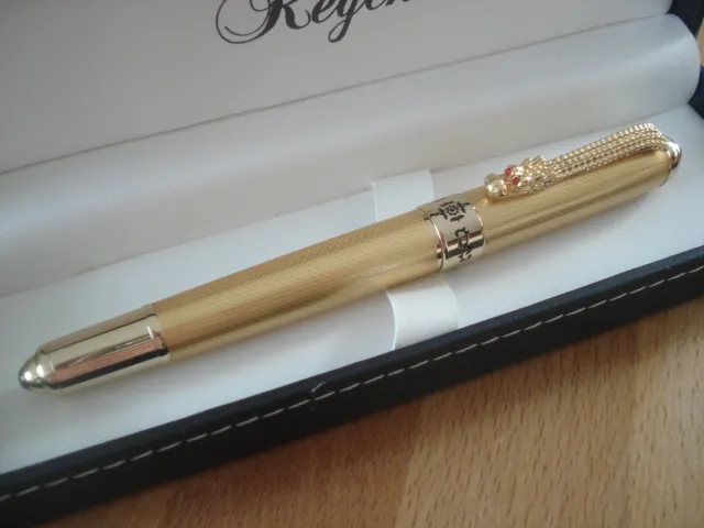 Stylo PLUME REGENT gold avec écrin barrette dragon