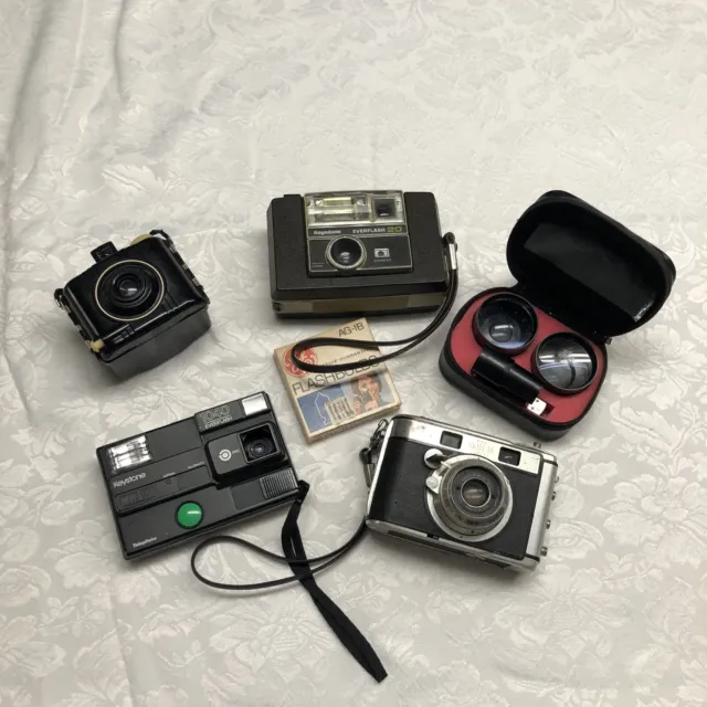 Lot of 4 Assorted Cameras Plus Lenses and Flashbulbs Baby Brownie FOR PARTS ONLY