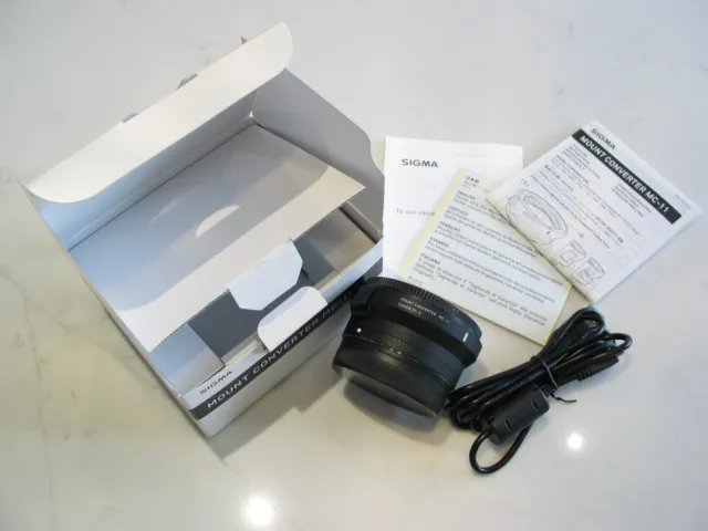 Convertidor de montaje Sigma MC-11 Canon EF a Sony FE NEX E cable de instrucción en caja