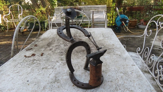 sculpture XXème représentant un forgeron