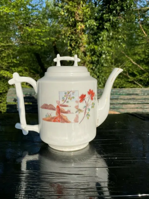 Théière ou cafetière en porcelaine et ancienne  