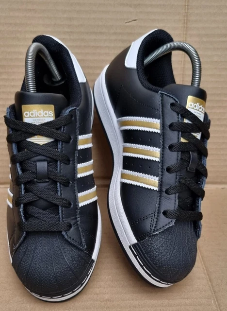 Adidas trainer nere e oro on sale