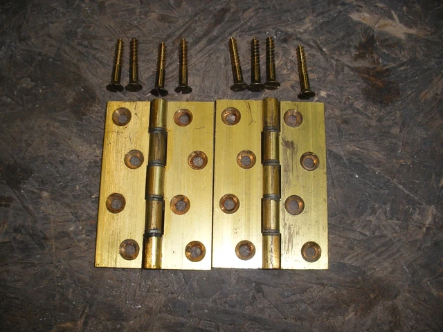 Reclaimed solid brass 4" hinges with steel washers and original brass screws