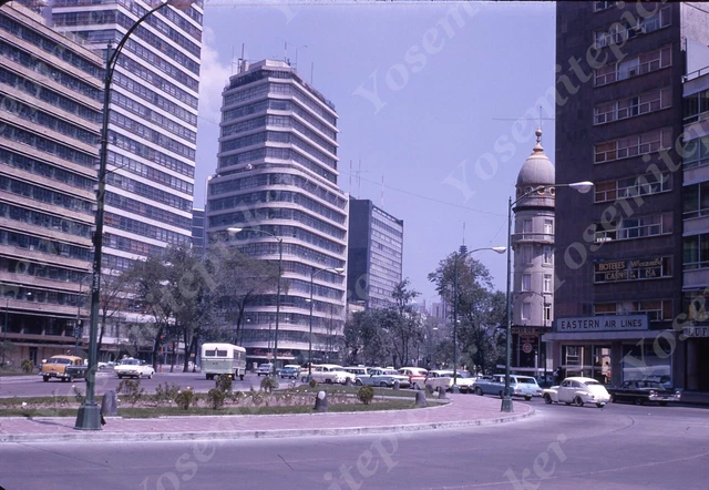 Sl62  Original slide 1965 Mexico  Downtown traffic cars 703a