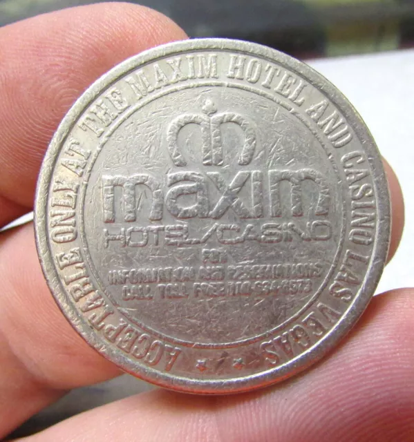 vintage 1979 Maxim Hotel Las Vegas Nevada $1 token coin, collectible slot token