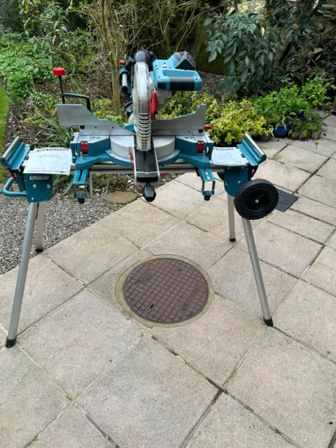 Erbauer sliding compound mitre saw with stand in good working condition.