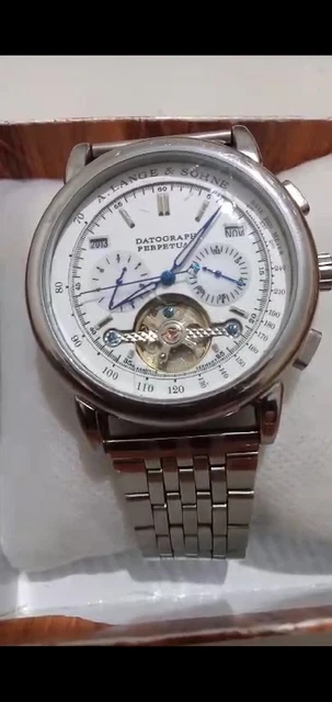 Montre datographe Perpetuel