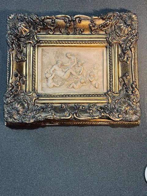 Antique marble plaque of gods and cherubs in a gilt frame