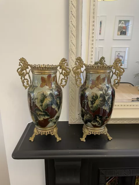 A pair of ormolu-mounted porcelain vases in the Sevres style, early to mid 20th