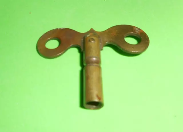 Antique  mantel mechanical wind up clock key brass