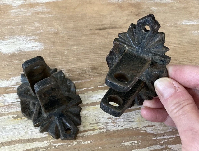 Vintage pair of cast iron swing arm oil lamp or planter wall mount brackets