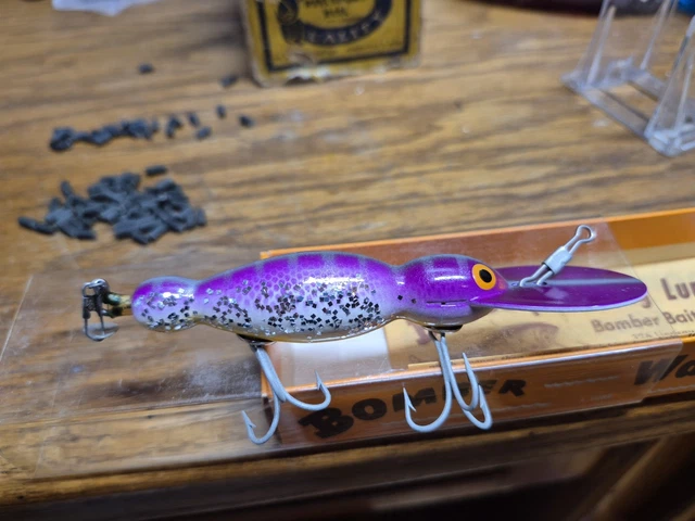 bomber waterdog fishing lure 1600 Series, #58 Smoke Color w/Box Equipped with treble hooks to improve hookup rates during strikes If you were to fish