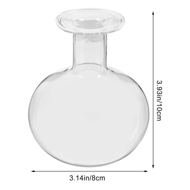 Hermosos centros de mesa de mesa con botella de vidrio transparente botella de flores