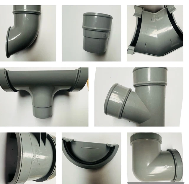 Graue halbrunde Dachrinne und Fallrohrbeschläge 112 mm, 68 mm Union Stopper Ausgang