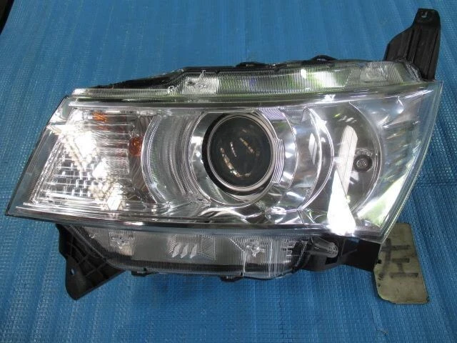 NISSAN Roox 2010 DBA-ML21S Faro sinistro 022604A00H [usato] [PA01968602]