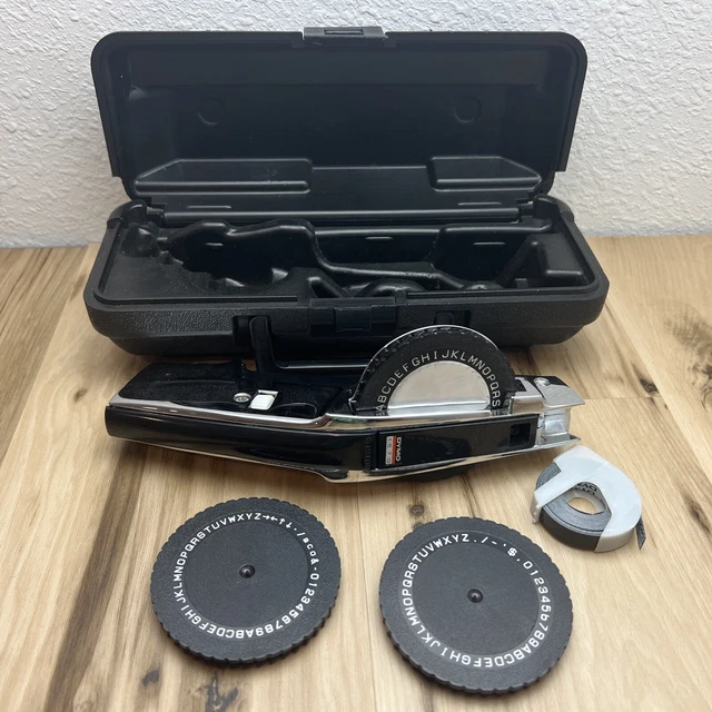 DYMO 1570 Tapewriter Label Maker Chrome With Hard Carrying Case And 3 Wheels