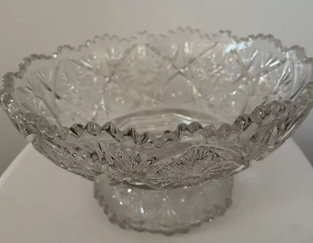 vintage brilliant Cut Glass Bowl Starburst Pattern with saw tooth edge.