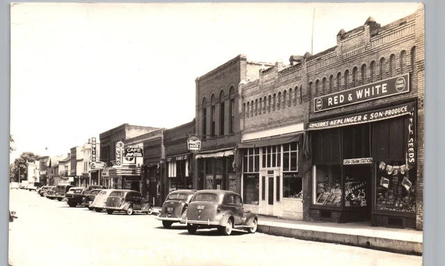 RIVER STREET VIEW real photo postcard rppc DELANO MINNESOTA MN 1940s shops cars