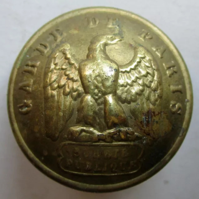 Bouton bombé en métal doré à l'aigle impérial Garde de Paris Sureté Publique GM