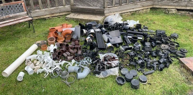 Gutter and Drainage System joints and connectors- bought new but stored outside.