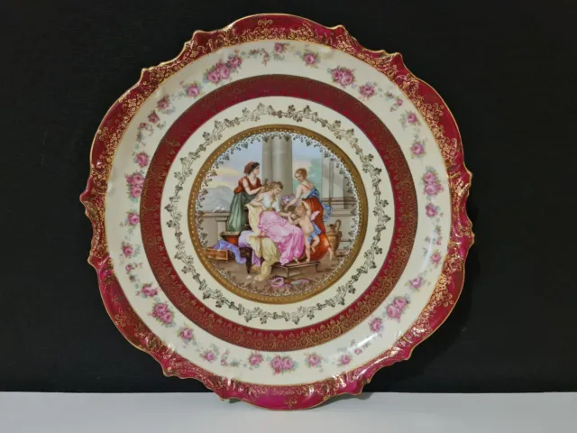 Ancienne et belle assiette décorative en céramique à décor de personnages - XXe