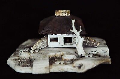 Japanese hand-carved bovine bone sculpture of a home and its environs - detailed