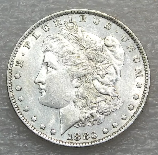 1883 O Morgan Silver Dollar AU/BU White Frosty Luster in saflip #H860